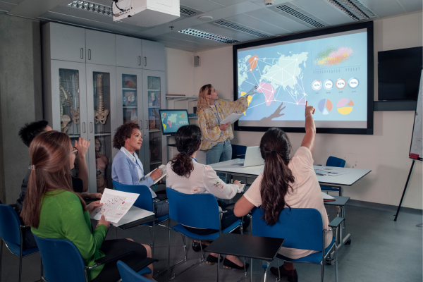 student delivering a presentation to a class