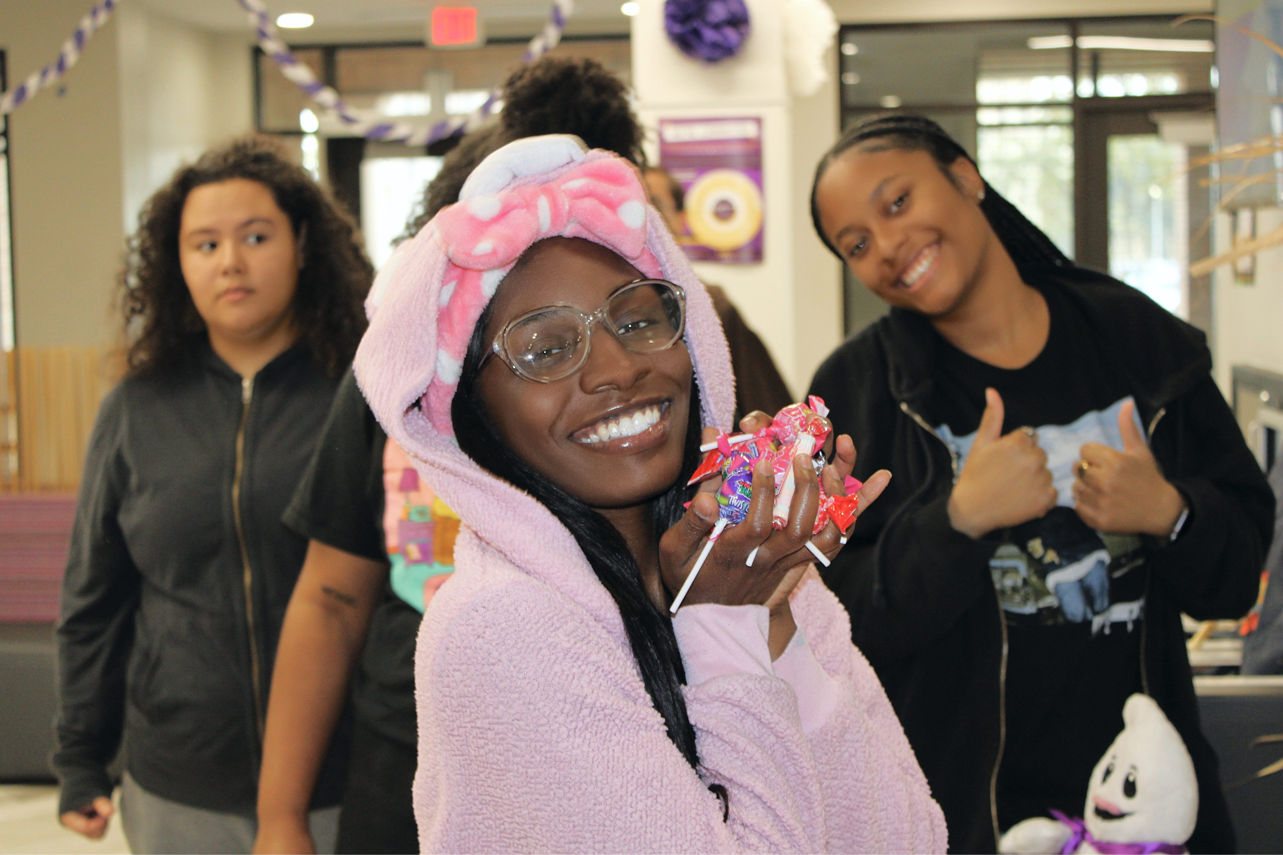 Student dressed in a halloween costume at an Azalea Hall event.