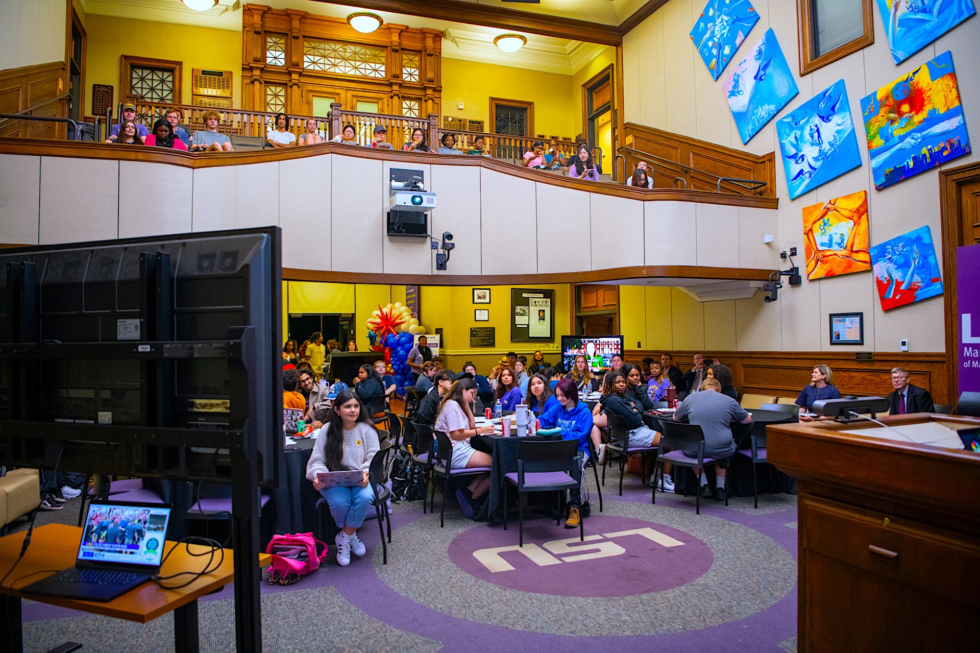 Event in the Holliday Forum of the Journalism Building